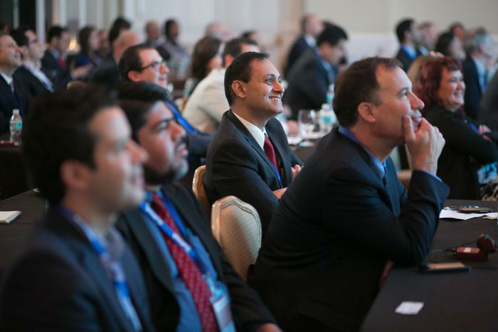 The attendees engaged in lively discussion with the guest speakers throughout day one.